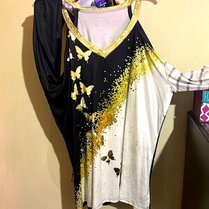 Shoulders out:) gold white and black butterfly blouse